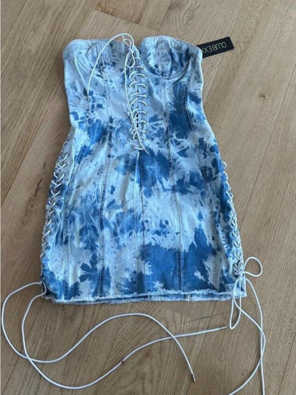 Dolls Kill Club Exx Lovesick Girls Lace Up Acid Wash Denim Mini Dress in Blue &